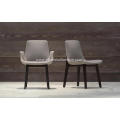 Brown faux leather armless Ventura chairs